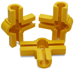 A group of yellow plastic pieces sitting on top of each other.